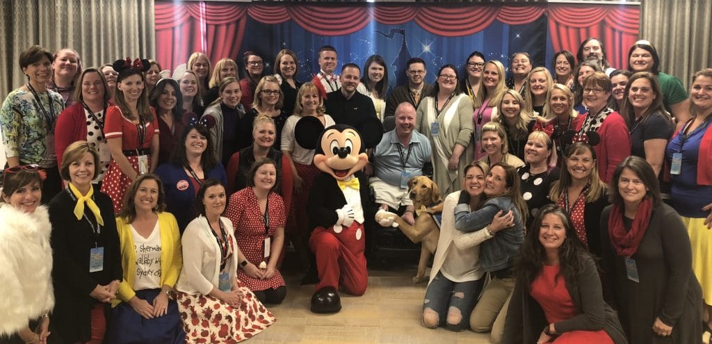 Group photo with Mickey Mouse and friends.